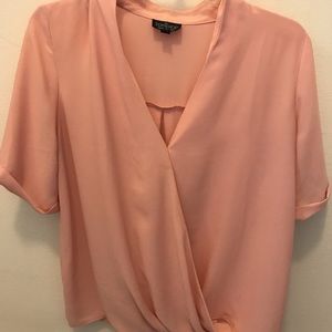 Pink T-shirt blouse.